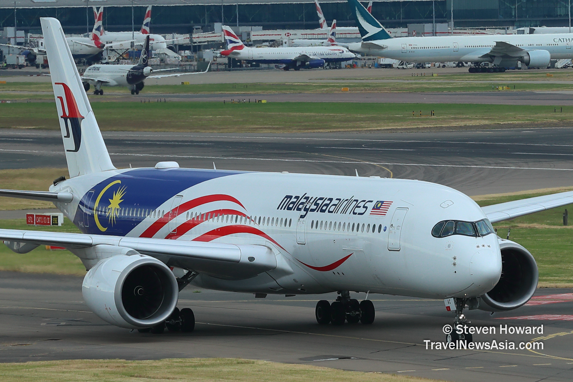 Malaysia Airlines A350-900 reg: 9M-MAC at LHR. Picture by Steven Howard of TravelNewsAsia.com Click to enlarge.